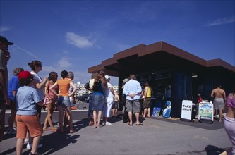 ENGLAND, West Sussex, Littlehampton, "People queuing at the East Beach Cafe, a seafront structure