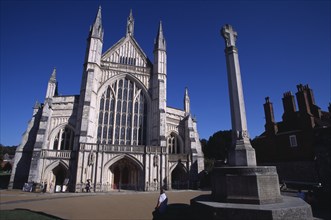 ENGLAND, Hampshire, Winchester, Winchester Cathedral. West elevation with war memorial in the