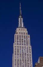USA, New York, New York City, "Part view of the Empire State Building from East 34th Street.  Art