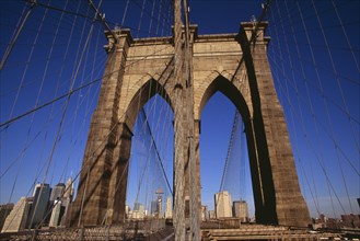 USA, New York, New York City, Brooklyn Bridge.  View along bridge to Manhattan skyline beyond part
