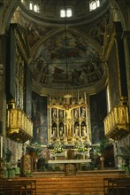 ITALY, Lombardy, Lake Garda, "Salo.  Interior of the Duomo with ornate golden altarpiece, crucifix