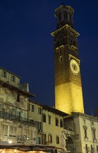 ITALY, Veneto, Verona, "Torre dei Lamberti clock tower in the Piazza Erbe illuminated at night part