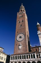 ITALY, Lombardy, Cremona, Piazza del Comune.  Medieval bell tower known as the Torrazzo linked by a