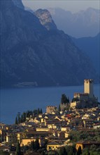 ITALY, Veneto, Lake Garda, "Malcesine.  View across town rooftops towards Castello Scaligero in
