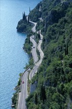 ITALY, Lombardy, Lake Garda Area, Aerial view over Gardesana Occidentale road beside Lake Garda