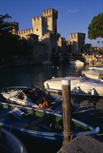 ITALY, Lombardy, Lake Garda , Sirmione.  Rocca Scaligera medieval castle with crowds of visitors