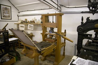 ENGLAND, West Sussex, Amberley, Amberley Working Museum. The Print Workshop with a collection of