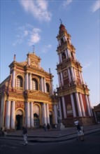 ARGENTINA, Salta, San Francisco Church exterior with people walking nearby