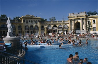 HUNGARY, Budapest, Szecheny Baths. People enjoying busy thermal water baths