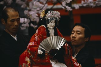 JAPAN, Arts, Performance, "Bunraku puppet female character with puppeteers.   Puppet is half life