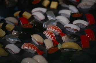 JAPAN, Markets, Food and Drink, Colourful window display of plastic sushi.