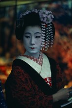 JAPAN, Customs, Geisha, "Three-quarter portrait of sixteen year old Someiyu, a maiko or apprentice