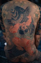 JAPAN, People, Yakuza, "Heavily tattooed back of gangster or Yakuza gang member in public bath