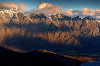 NEW ZEALAND, SOUTH ISLAND, OTAGO, "QUEENSTOWN, SHADOWS OF CLOUDS UPON THE REMARKABLES MOUNTAIN