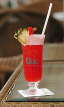 SINGAPORE, Cocktail, "A SINGAPORE SLING COCKTAIL AT THE LONG BAR OF THE RAFFLES HOTEL WHERE THE