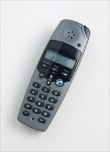 COMMUNICATIONS, Telephone, Cordless, DECT telephone handset with green answer button. Digital