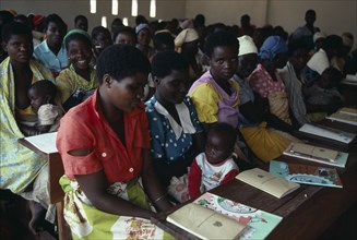 MALAWI, Adult Education, "Adult literacy class for refugees from Mozambique in Kunyinda Camp.