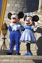 USA, Florida, Orlando, Walt Disney World Resort. Mickey and Minnie Mouse characters on stage in the