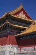 CHINA, Beijing, Forbidden City.  Detail of highly decorated pagoda style rooftops.