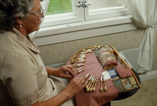 FINLAND, Rauma, Woman making lace.
