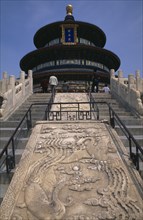 CHINA, Beijing, Tiantan Park.  Stone walkway and view up steps towards the Hall of Prayer for Good