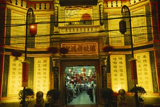 CHINA, Beijing, "Silk Emporium on Dazhalan Jie, exterior facade illuminated at night with open