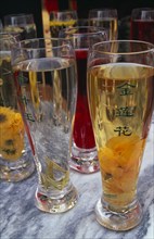 CHINA, Beijing, Selection of teas in tall glasses.