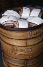 CHINA, Shanghai, Steamed buns in bamboo steamer.