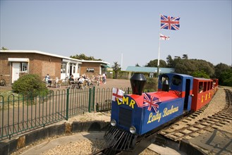 ENGLAND, West Sussex, Littlehampton, Families enjoying the Miniature Railway train ride at Norfolk