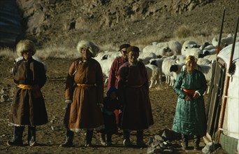 MONGOLIA, Gobi Desert, Biger Negdel, Khalkha winter sheep camp with complete family  father mother