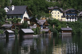 AUSTRIA, Oberosterreich, Hallstatt, Typical architecture and boat houses on shore of Hallstattersee