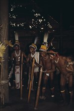 COLOMBIA, North West Amazon, Tukano Indigenous People, Barasana stave dance.  Line of male dancers