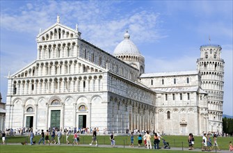 ITALY, Tuscany, Pisa, The Campo dei Miracoli Field of Miracles. Tourists walking past the 12th