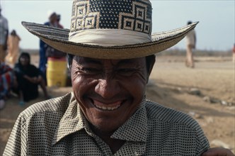 COLOMBIA, Guajira Peninsula, Guajiro Indians, Head and shoulders portrait of laughing Guajiro
