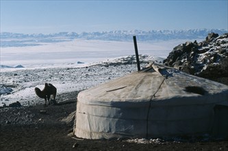 MONGOLIA, Gers/Yurts, "Khalkha winter sheep camp. Ger or Yurt with flu pipe from interior