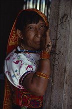 PANAMA, San Blas Islands, Kuna Indians, "Portrait of older Kuna Indian woman wearing traditional