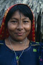 PANAMA, San Blas Islands Ustupu, Kuna Indians, Portrait of smiling Kuna woman with gold nose ring