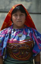 PANAMA, San Blas Islands Tikantiki , Kuna Indians, Portrail of Kuna girl wearing fine traditional