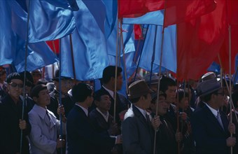 MONGOLIA, Ulan Bator, "Nadam  National Day Parade of workers and party members carrying red and