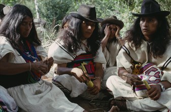 COLOMBIA, Sierra Nevada de Santa Marta, Ika, Ika widow and sons at mortuary rites being performed
