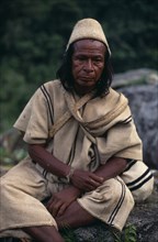 COLOMBIA, Sierra Nevada de Santa Marta, Ika, Portrait of Ika mama priest Juan de Jose wearing