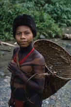 COLOMBIA, Choco, Embera Indigenous People, Portrait of young Embera with lower face and body