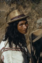 COLOMBIA, Sierra Nevada de Santa Marta, Ika, Portrait of Ika man in traditional dress driving his