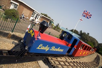 ENGLAND, West Sussex, Littlehampton, Families enjoying the Miniature Railway train ride at Norfolk