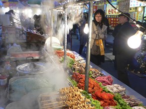 KOREA, South, Seoul, "Namdaemun - Namdademun market, December evening, steam rising from food