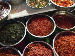 KOREA, South, Seoul, "Namdaemun - Namdaemun market, stainless steel bowls full of kimchi for sale"