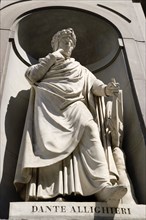ITALY, Tuscany, Florence, Statue of the poet and writer Dante Allighieri in the Vasari Corridor