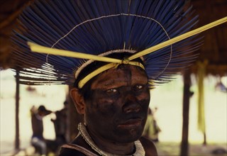 BRAZIL, Mato Grosso, Indigenous Park of the Xingu, Portrait of Panara male elder wearing ceremonial