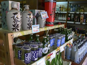 JAPAN, Honshu, Tokyo, "Chiba, Narita - Chiyomeisen sake shop, sake on display inside the shop"