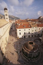 CROATIA, Dalmatia, Dubrovnik, "Elevated view over cobbled square with circular stone building in